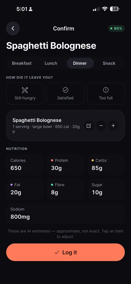 The JustAte Confirm screen showing an editable nutrition estimate with a confidence level